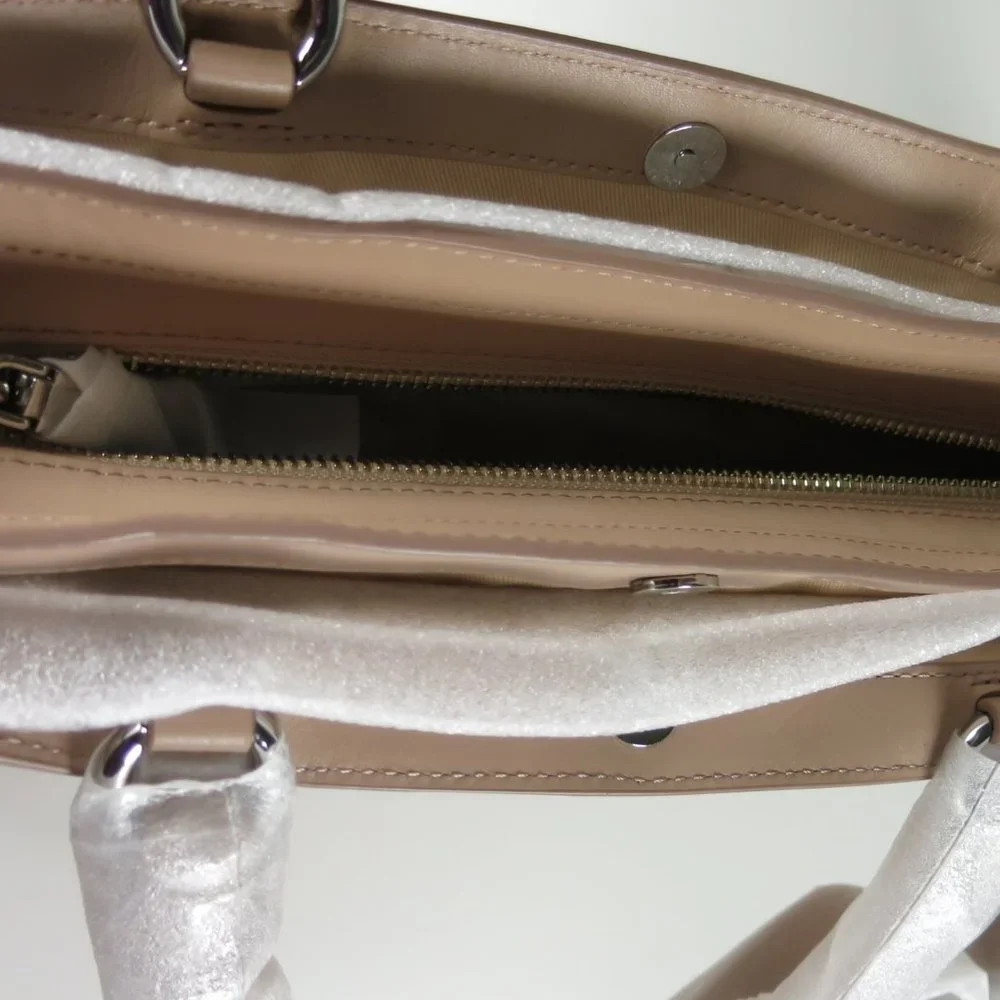 Rebecca Minkoff disclaimer color
